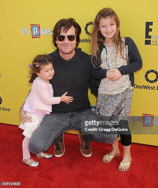 Actor Jason Bateman and children arrive at the P.S. ARTS Express Yourself 2014 at The Barker Hanger on November 16, 2014 in Santa Monica, California.
