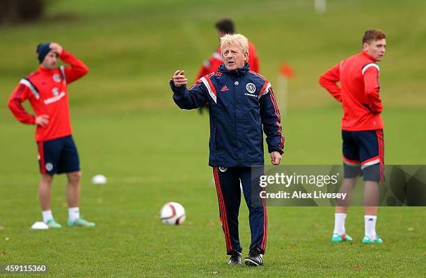 Gordon Strachan the manager of Scotland directs his players during a training session at Mar Hall Hotel in Bishopton on November 17, 2014 in Glasgow,...