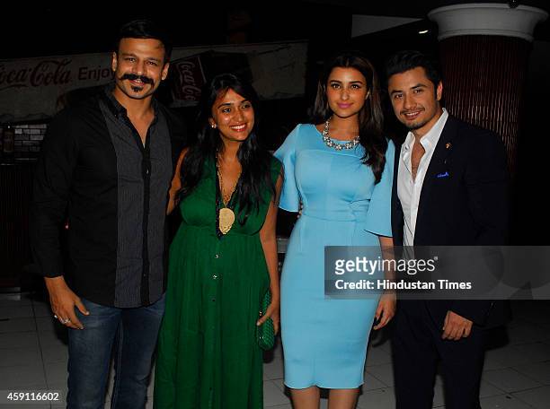 Bollywood actor Vivek Oberoi and his wife Priynaka with actors Parineeti Chopra and Ali Zafar during the screening of film Kill Dil at Chandan...