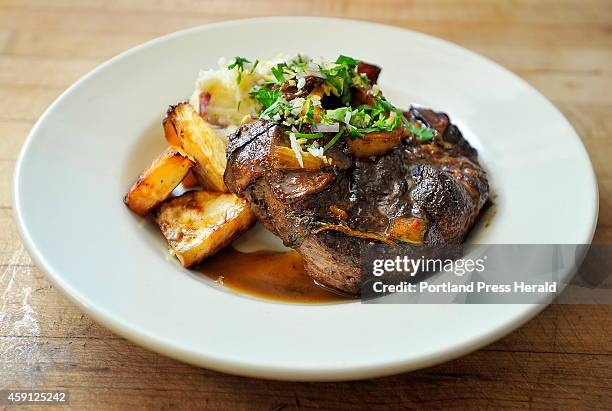 Beef Osso Bucco, a special of the night at The Good Table in Cape Elizabeth, is made from red wine braised beef osso bucco, served with roasted local...