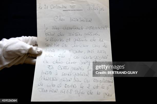 Photo shows a letter written by French actress Brigitte Bardot, on November 17, 2014 in Paris, before an auction sale of 1,500 documents written by...