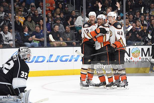Ryan Getzlaf, Emerson Etem, and Josh Manson of the Anaheim Ducks celebrate during a game against the Los Angeles Kings at STAPLES Center on November...