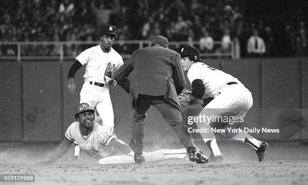 New York Yankees vs Kansas City Royals Frank White of Royals is out trying to steal second in third inning last night as Yanks' Bucky Dent makes tag.