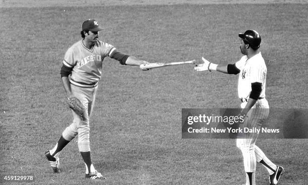 New York Yankees vs Kansas City Royals Eager Yankee Cliff Johnson loses bat on swing in the fifth inning and then courteous KC pitcher Andy Hassler...