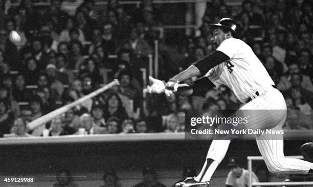 New York Yankees vs Kansas City Royals Eager Yankee Cliff Johnson loses bat on swing in the fifth inning and then courteous KC pitcher Andy Hassler...