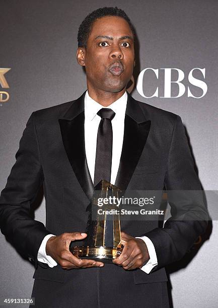 Chris Rock poses at the 18th Annual Hollywood Film Awards at the Hollywood Palladium on November 14, 2014 in Hollywood, California.