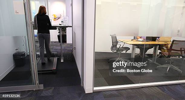Philips North America campus co-ordinator Chelsey Guselli uses a walking station on October 8, 2014.