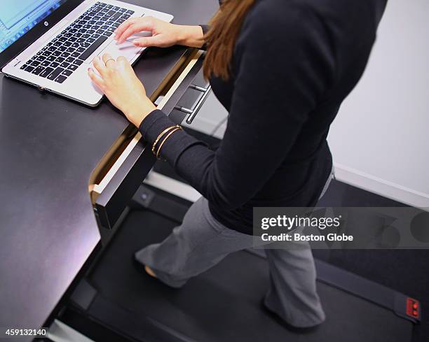 Philips North America campus co-ordinator Chelsey Guselli uses a walking station on October 8, 2014.