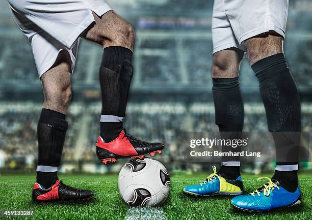 two football players at kick-off in stadium - anstoß sportbegriff stock-fotos und bilder