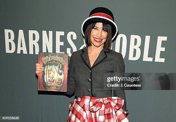 Actress Evangeline Lilly attends a signing for her new book "The Squickerwonkers Vol 1" at Barnes & Noble Tribeca on November 17, 2014 in New York...