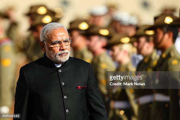 Indian Prime Minister Narendra Modi inspects the gaurd at Parliament House on November 18, 2014 in Canberra, Australia. Prime Minister Narendra Modi...