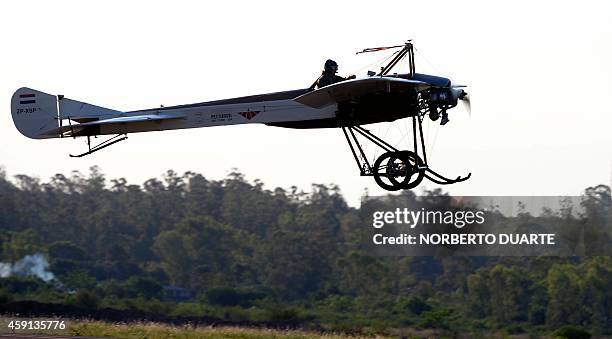 Paraguayan aviation engineer Juan Carlos Parini flies a replica of the Deperdussin aircraft used by the first Paraguayan pilot Silvio Pettirossi,...