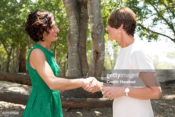 Mrs Margie Abbott of Australia greets Mrs Agnese Landini of Italy, as part of the G20 Leaders' Spouse programme on November 15, 2014 in Brisbane,...