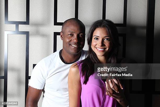Former West Indian cricket player Brian Lara poses for a portrait with his partner, Jamey Bowers on November 17, 2014 in Sydney, Australia. Lara is...