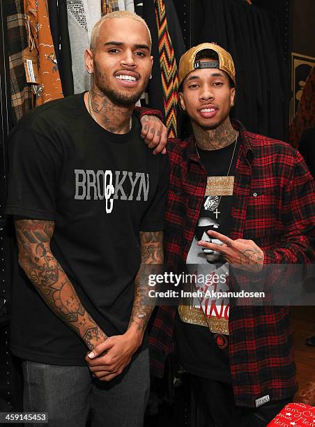 Singer Chris Brown and rapper Tyga attend the 1st Annual Xmas Toy Drive hosted by Chris Brown and Brooklyn Projects on December 22, 2013 in Los...