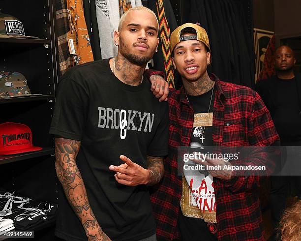 Singer Chris Brown and rapper Tyga attend the 1st Annual Xmas Toy Drive hosted by Chris Brown and Brooklyn Projects on December 22, 2013 in Los...