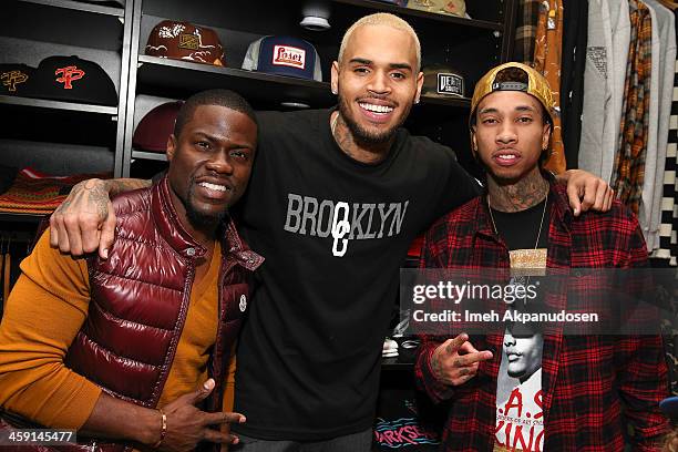 Comedian Kevin Hart, singer Chris Brown, and rapper Tyga attend the 1st Annual Xmas Toy Drive hosted by Chris Brown and Brooklyn Projects on December...