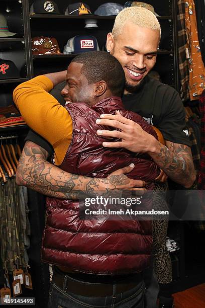 Singer Chris Brown and comedian Kevin Hart attend the 1st Annual Xmas Toy Drive hosted by Chris Brown and Brooklyn Projects on December 22, 2013 in...