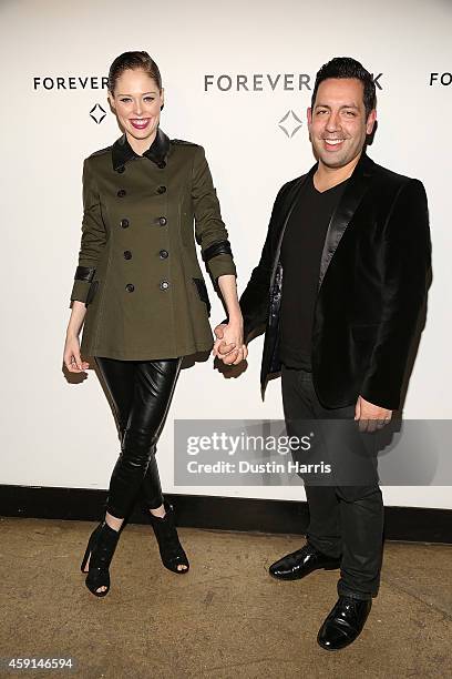 Coco Rocha and James Conrad attend Hold My Hand Forever Exhibition By Forevermark at Highline Studios on November 17, 2014 in New York City.