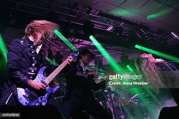 Chris Caffery, Roddy Chong and Joel Hoekstra of Trans-Siberian Orchestra perform onstage during an exclusive performance at The iHeartRadio Theater...