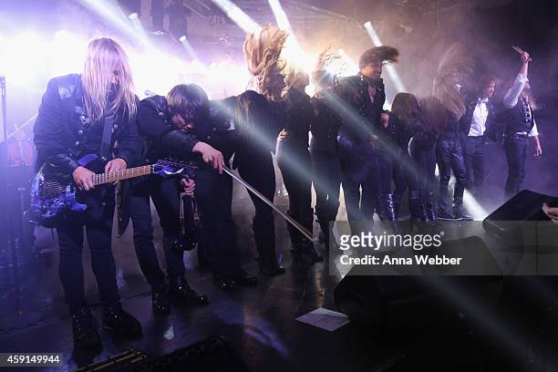 Chris Caffery, Roddy Chong, David Z, Joel Hoekstra, Derek Wieland and members of Trans-Siberian Orchestra take a bow onstage during an exclusive...