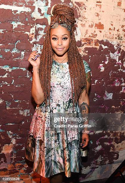 Recording artist Chrisette Michele attends Imported Peach Party at Cloud IX Lounge on November 17, 2014 in Atlanta, Georgia.