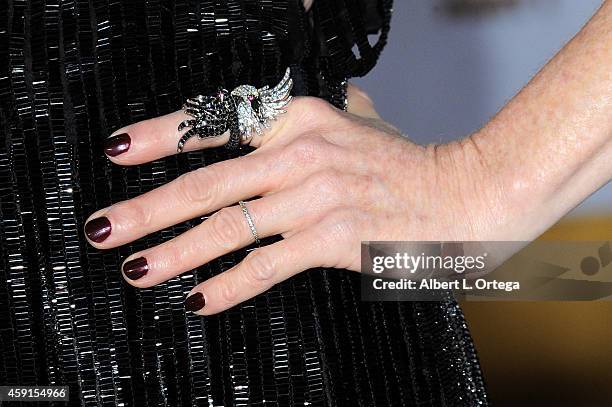 Actress Julianne Moore arrives for the Premiere Of Lionsgate's "The Hunger Games: Mockingjay - Part 1" held at Nokia Theatre L.A. Live on November...