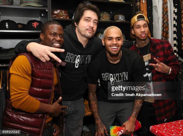 Comedian Kevin Hart, Brooklyn Projects Co-Owner & Founder Dom DeLuca, singer Chris Brown, and rapper Tyga attend the 1st Annual Xmas Toy Drive hosted...