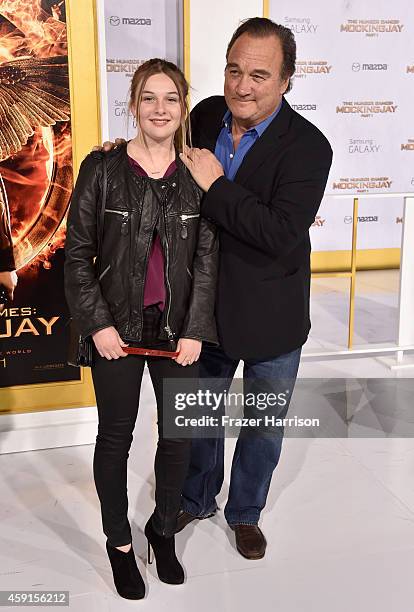 Jamison Bess Belushi and actor Jim Belushi attend the premiere of Lionsgate's "The Hunger Games: Mockingjay - Part 1" at Nokia Theatre L.A. Live on...
