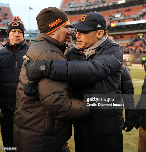 Head coach Marc Trestman of the Chicago Bears and head coach Rob Chudzinski of the Cleveland Browns shake hands after a game between the Cleveland...