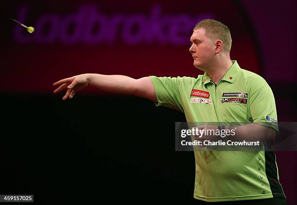 Ricky Evans of England in action during his second round match against Mervyn King of England during the Ladbrokes.com World Darts Championship on...