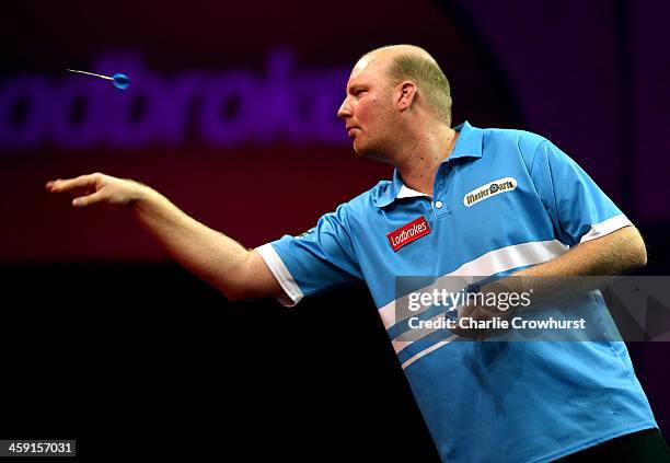 Vincent Van Der Voort of Holland in action during his second round match against Adrian Lewis of England during the Ladbrokes.com World Darts...