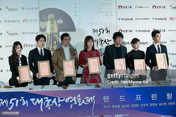 South Korean actors Seo Eun-Ah, Cho Jung-Seok, Ryu Seung-Ryong, Uhm Jung-Hwa, Song Kang-Ho, Jang Young-Nam and Kim Soo-Hyun attend the 51st Daejong...