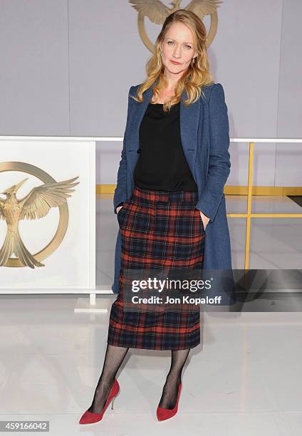 Actress Paula Malcomson arrives at the Los Angele Premiere "The Hunger Games: Mockingjay Part 1" at Nokia Theatre L.A. Live on November 17, 2014 in...