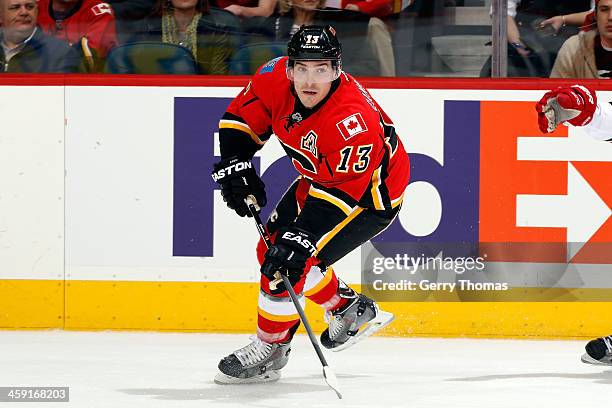 Michael Cammalleri of the Calgary Flames skates against the Carolina Hurricanes at Scotiabank Saddledome on December 12, 2013 in Calgary, Alberta,...