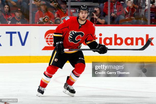 Brodie of the Calgary Flames skates against the Carolina Hurricanes at Scotiabank Saddledome on December 12, 2013 in Calgary, Alberta, Canada....