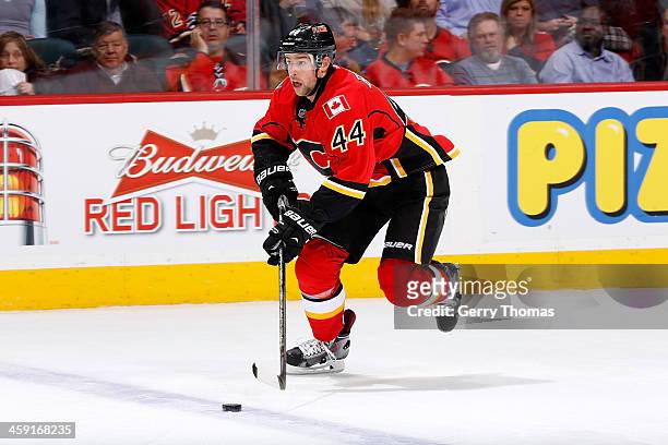 Chris Butler of the Calgary Flames skates against the Carolina Hurricanes at Scotiabank Saddledome on December 12, 2013 in Calgary, Alberta, Canada....