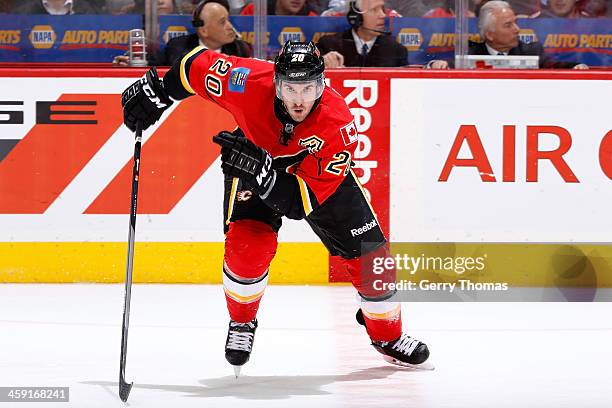 Curtis Glencross of the Calgary Flames skates against the Carolina Hurricanes at Scotiabank Saddledome on December 12, 2013 in Calgary, Alberta,...