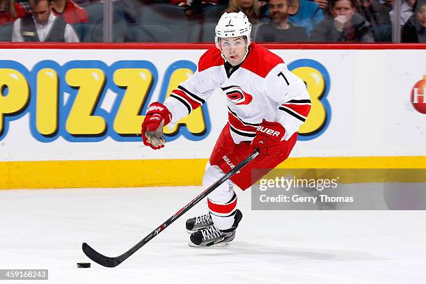 Ryan Murphy of the Carolina Hurricanes skates against the Calgary Flames at Scotiabank Saddledome on December 12, 2013 in Calgary, Alberta, Canada....