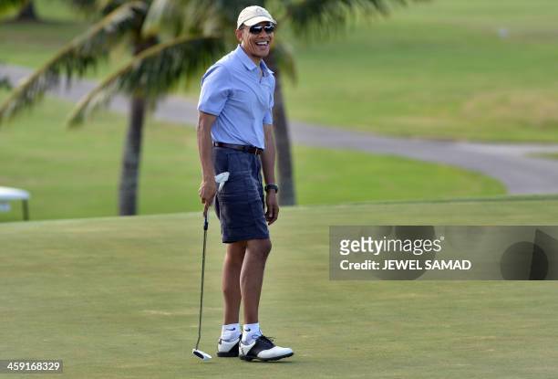 President Barack Obama plays golf at Mid-Pacific Country Club in Kailua, Hawaii 2013. The first family is in Hawaii for their annual holiday...