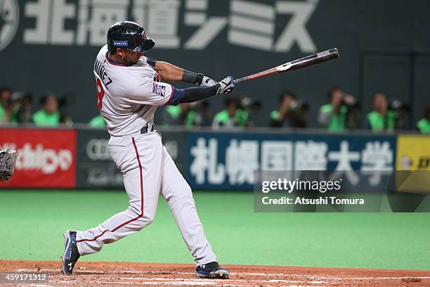 Eduardo Nunez of the Minnesota Twins hits a single in the fifth inning during the game five of Samurai Japan and MLB All Stars at Sapporo Dome on...