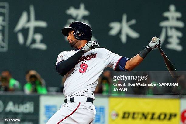 Eduardo Nunez of the Minnesota Twins hits a RBI in the sixth inning during the game five of Samurai Japan and MLB All Stars at Sapporo Dome on...