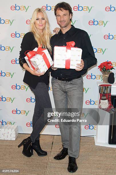 Model Carolina Cerezuela and tennis player Carlos Moya attend the 'Christmas Ebay ambassadors' campaign photocall at Casa Club Espacio Cultural on...