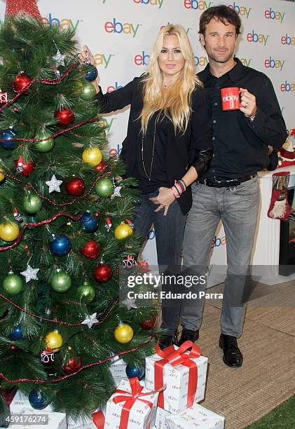 Model Carolina Cerezuela and tennis player Carlos Moya attend the 'Christmas Ebay ambassadors' campaign photocall at Casa Club Espacio Cultural on...