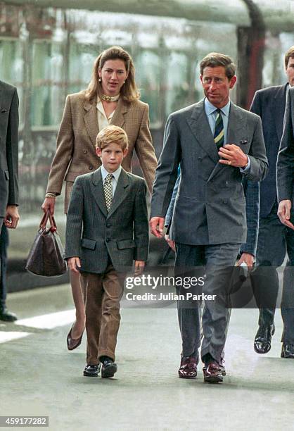 Charles, The Prince of Wales, and Prince Harry, with nanny, Tiggy Legge Bourke, arrive at Aberdeen Railway Station, heading for Balmoral Estate,...