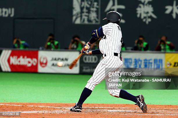 Ryosuke Kikuchi of Samurai Japan bats during the game five of Samurai Japan and MLB All Stars at Sapporo Dome on November 18, 2014 in Sapporo,...