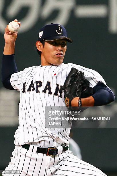 Shoichi Inou of Samurai Japan pitches in the fifth inning during the game five of Samurai Japan and MLB All Stars at Sapporo Dome on November 18,...