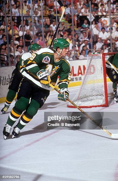 Mike Modano of the Minnesota North Stars skates on the ice during the 1991 Stanley Cup Finals against the Pittsburgh Penguins in May, 1991 at the...