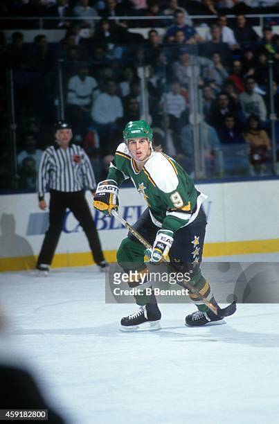 Mike Modano of the Minnesota North Stars skates on the ice during an NHL game against the New York Islanders on January 8, 1991 at the Nassau...