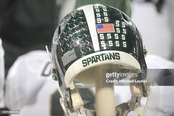 Michigan State Spartans helmet on the bench during a college football game against the Maryland Terrapins at Byrd Stadium on November 15, 2014 in...